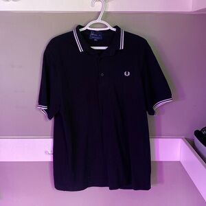 Fred Perry polo shirt. Black with white strips. Worn once. Very good condition.